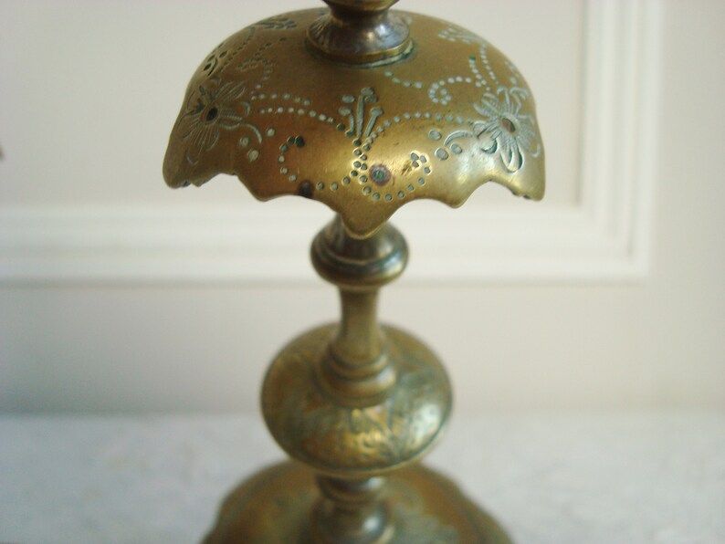 Pair ornate antique candlesticks with elegant engraved motifs 19th century candle holders