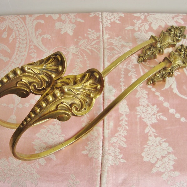 Large pair of antique tie back hooks in rococo style bronze from a Lyon chateau