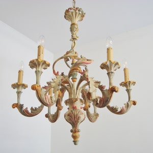 Vintage chandelier with scrolled acanthus leaves and a polychromed finish florentine style
