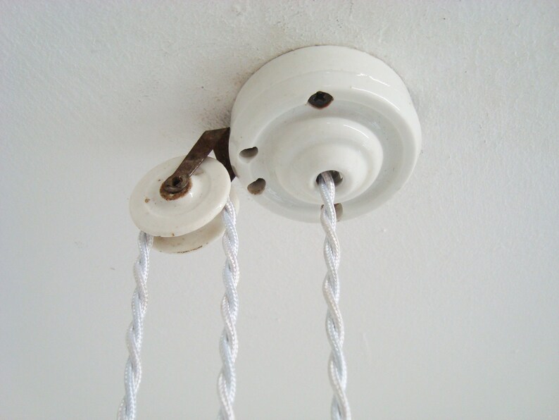 Vintage French rise and fall chandelier with a blue and white mottled glass shade