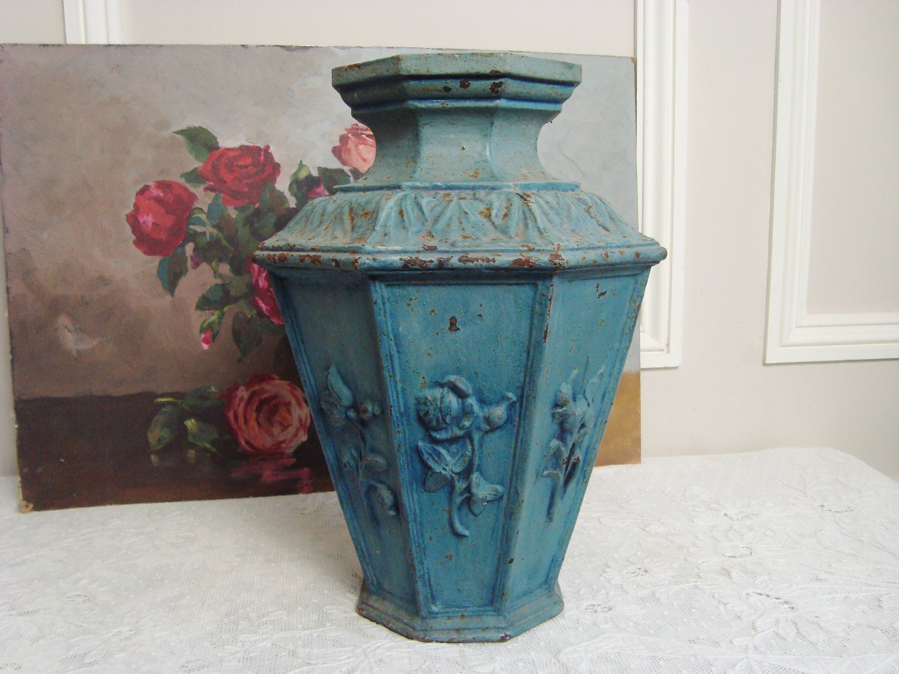 Antique French cast iron vase with floral motifs from a Etsy