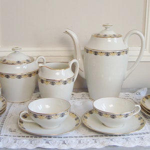 Vintage coffee set in Limoges porcelain white and gold with Art Deco motifs made by C Ahrenfeldt