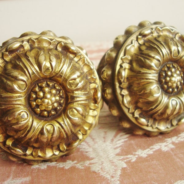 Pair antique sunflower finials in repousse brass Embossed metal curtain pole ends