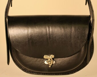 Black leather handbag handmade in USA using a moulded form