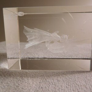 Heavy paperweight- clear with angel figure suspended within