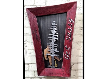 DANkWOOD Bigfoot Get Sassy, Whimsical rustic hardwood frame, Upcycled, wONKy, CroOKed, metal sasquatch gett'n sassy behind the trees