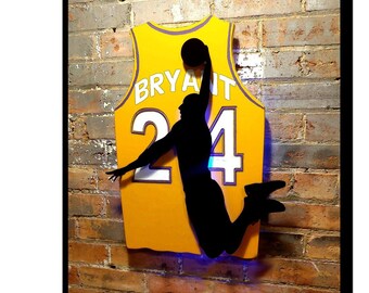 LAK3RS MVP, multi layered jersey wall art, 24. backlit with LED lights, Customize with your team, concealment furniture, hidden case,