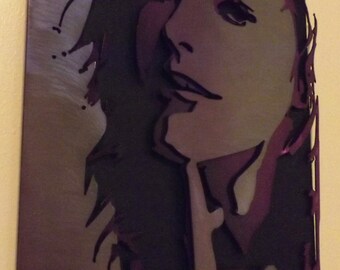 Milla 3D multi-layered brushed metal silhouette mounted on a black frame