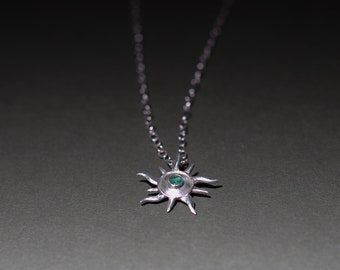 Sunburst silver Pendant with Emerald