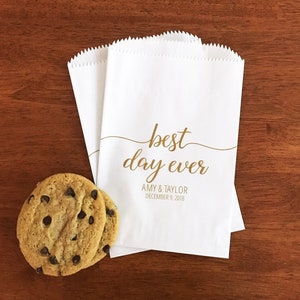 May include: A set of three ceramic mugs with a speckled, matte finish. The mugs are in shades of cream, light gray, and dark gray. Each mug has a simple, minimalist design, perfect for coffee or tea.