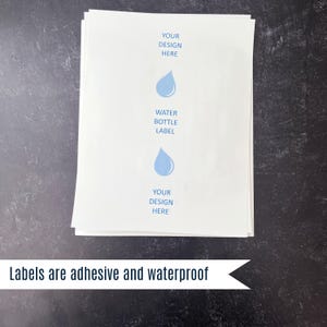 labels are adhesive and waterproof on a piece of paper