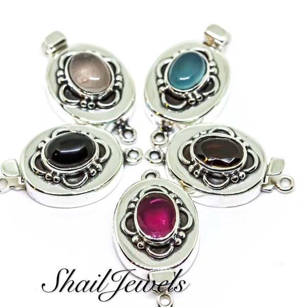 Box clasps in solid sterling silver 92.5. with gemstones. Oval. Clasp. Locks good.