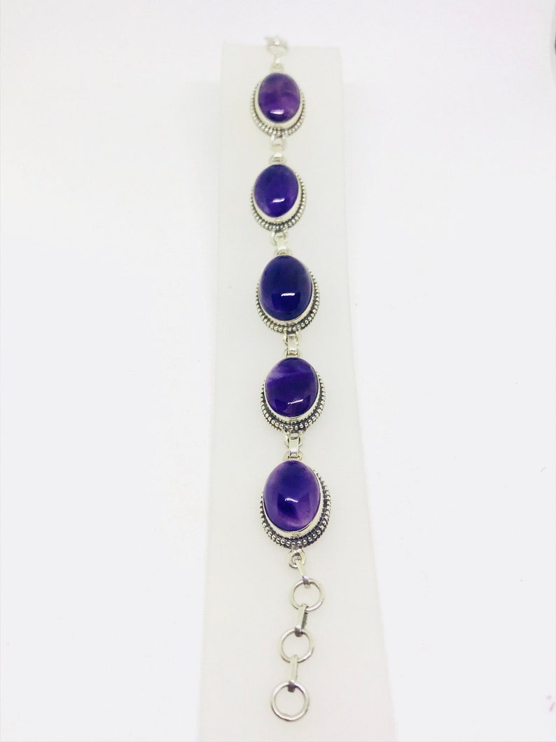 Genuine amethyst stones and adjustable length as links attached Perfectly matched. Amethyst Bracelet set in sterling silver 925