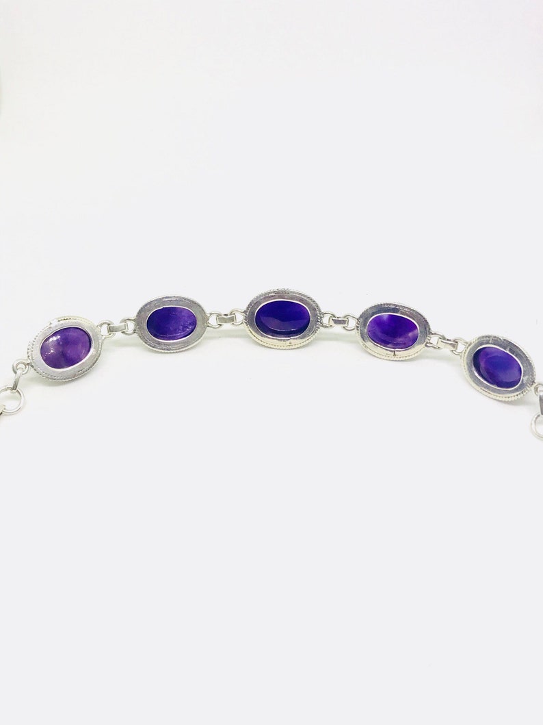 Genuine amethyst stones and adjustable length as links attached Perfectly matched. Amethyst Bracelet set in sterling silver 925