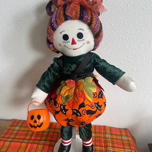 Raggedy Ann is A little pumpkin queen. Custom made to order. Cosplay collectible