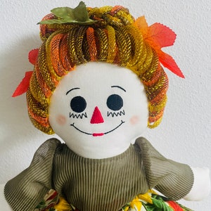 Raggedy Ann is a harvest princess. Custom made to order. Cosplay collectible