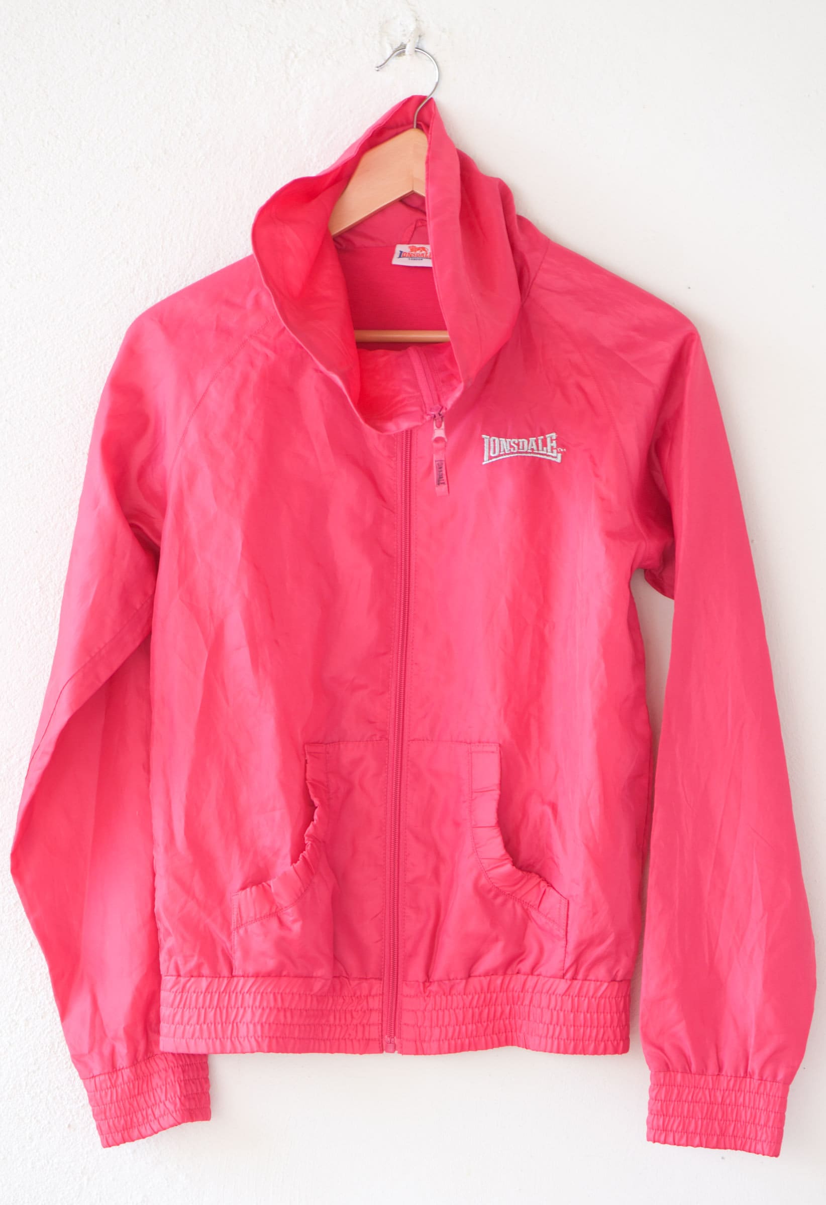 Image of Hot Pink Jacket Shell Suit Tracksuit Top Lonsdale London Vintage Fitness Sportswear High Neck Cotton Polyester Lined Adult Size Small