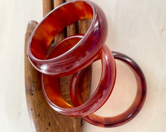 bakelite bangles burnt orange honey marbled set of 3 varied widths collectible early plastic French vintage jewellery tested MCM 1960s 130g