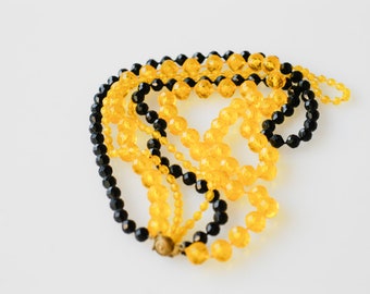 bead necklace vintage faceted early plastic yellow black multi strand long jewellery brass clasp 1960s midcentury modern beaded jewellery