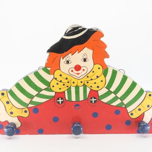 Colecciones con "clown gancho rack vintage colorido niños vivero