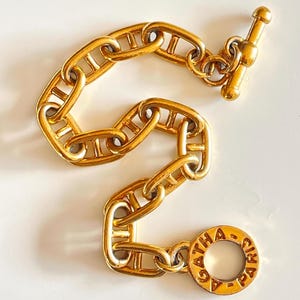 bracelet anchor link chain French vintage Agatha Paris jewellery polished gold tone metal stamped designed costume jewellery adult size 80s
