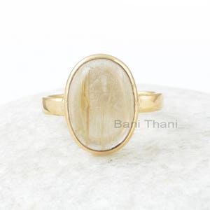 Golden rutile gemstone top