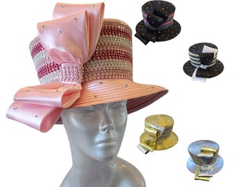 Make a statement on a special occasion with elegance and glamour with a swan hat designer derby church hat