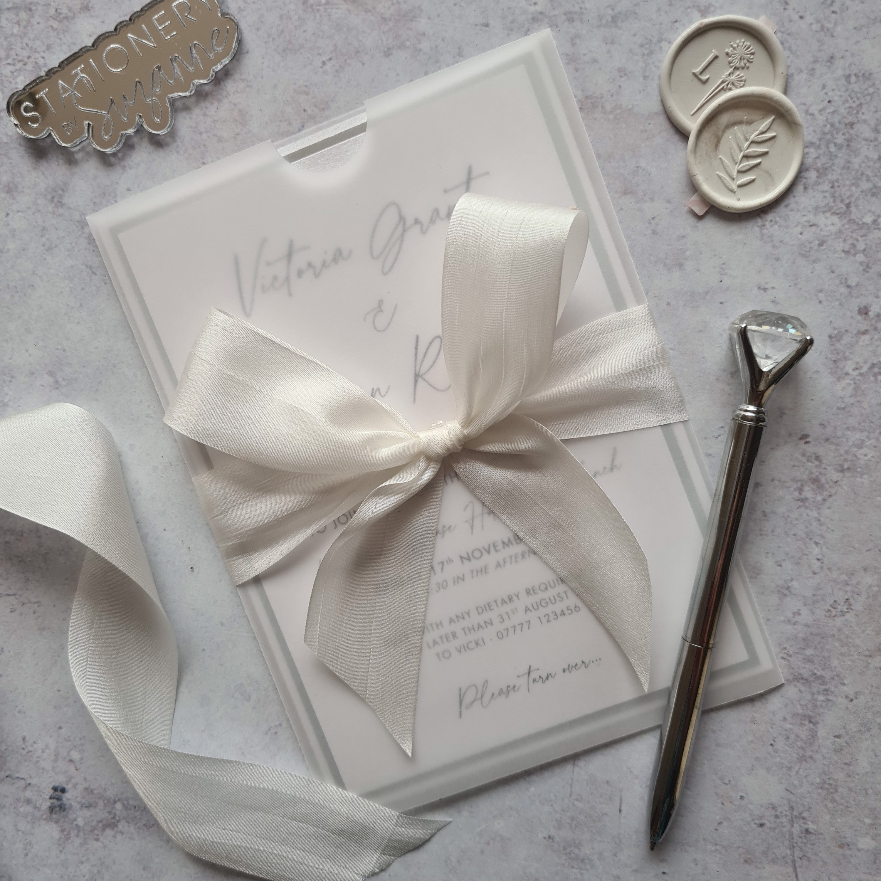 White Vellum Sleeve Wedding Invitation With Hand Dyed Silk Bow Silver