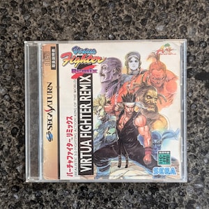 正規品 - バーチャファイター リミックス - セガサターン - NTSC-J - 日本製 - 英語で再生可能 - ケース、ゲーム、マニュアルが含まれますが、アートワークは含まれません。