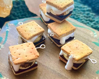 Marcador de puntos con forma de S'mores; accesorios de tejido; registro de progreso