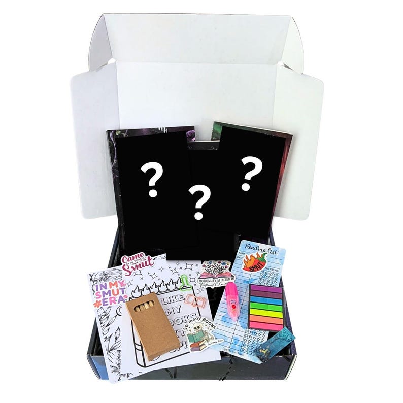 May include: An open black box filled with various stationery items and three black cards with white question marks. The box contains a reading list, sticky notes, a pink highlighter, and a small coloring book with colored pencils.