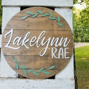 Custom Nursery Name Sign: 24&quot; Round Shiplap Wood, Wreath Laurels