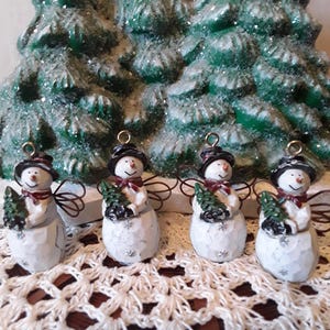 Vintage/Seasonal decorations/Set of 4/Danz/Snowman Christmas tree ornaments/snowman with angel wings/top hat/resin/2 inches tall