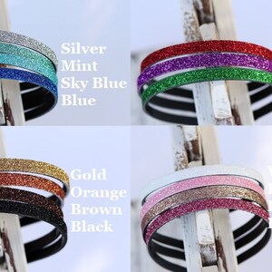 Pu&ograve; includere: Un set di 10 fasce per capelli con glitter in vari colori, tra cui argento, menta, azzurro, blu, rosso, lavanda, verde, oro, arancione, marrone, nero, bianco, rosa, rosa pallido e rosa acceso.