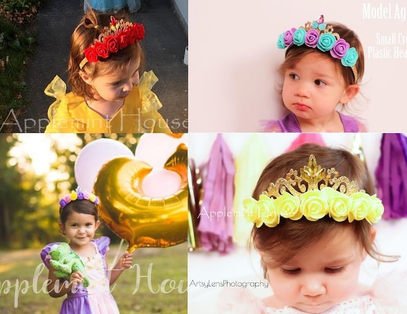 May include: Three young girls wearing flower crowns. The crowns are made of plastic and have a variety of colors, including red, yellow, blue, and purple. The crowns are decorated with glitter and have a small plastic tiara on top.