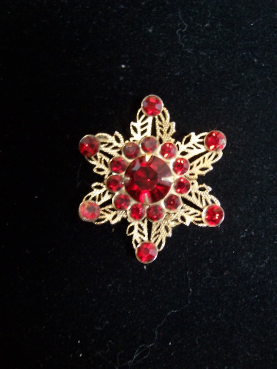 Vintage red and gold snowflake pin