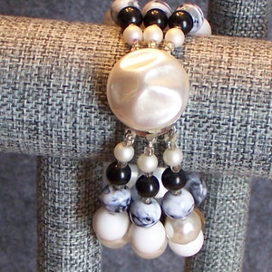 Triple-strand vintage beaded bracelet, black, cream, and silver, nice!