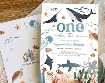 May include: A blue and white invitation with a whimsical illustration of sea creatures, including a whale, a narwhal, a shark, a jellyfish, and an octopus. The text reads "one der the sea" and "Kayden's First Birthday". The invitation includes the date, time, and location of the party.