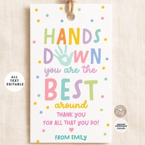 May include: A white gift tag with colorful text that reads "HANDS DOWN you are the BEST around THANK YOU FOR ALL THAT YOU DO!" with a heart and "FROM EMILY". The tag has a hole at the top with a twine string.