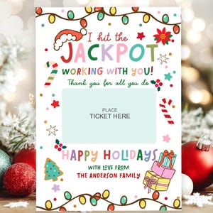 May include: A festive Christmas card with the text "I hit the JACKPOT WORKING WITH YOU!" and "HAPPY HOLIDAYS". The card features a Santa hat, string lights, and gift illustrations. It includes a space to "PLACE TICKET HERE".