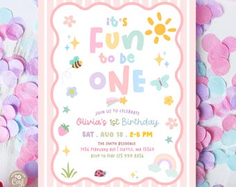 May include: A rectangular birthday invitation template with a pink and white striped background. The centre features a white scalloped frame with the text "it's Fun to be ONE" and "Olivia's 1st Birthday" surrounded by colourful icons of a sun, bee, butterfly, rainbow, and strawberry.