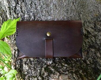 Brown leather tobacco pouch for rolling tobacco strap