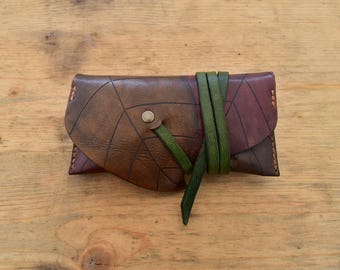 Leather tobacco pouch, engraved with a tobacco leaf