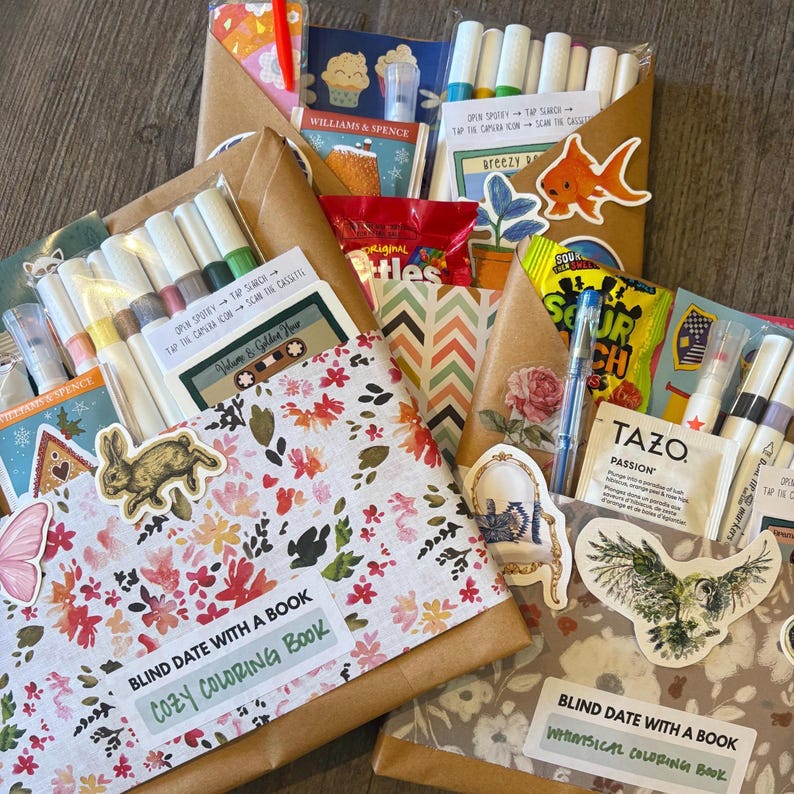 May include: A collection of wrapped packages, each adorned with stickers and containing various items. The packages include coloring books, markers, snacks, and tea. Floral and patterned paper wraps the packages, creating a visually appealing assortment.