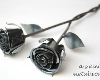 Intertwined Steel Roses: Anniversary Metal Flower Sculpture