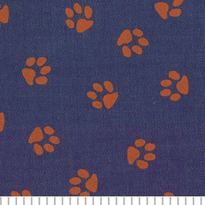 Orange Tiger paw on purple denim fabric from Fabric Finders, orange paw print denim, orange paw print fabric by the yard for sewing apparel