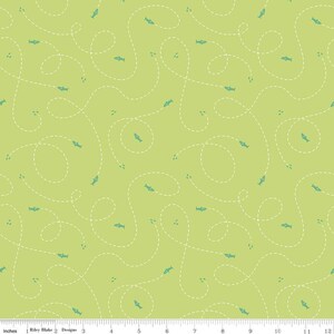May include: A green fabric with a white dashed line pattern and blue fish silhouettes. The fish are swimming in a random pattern.
