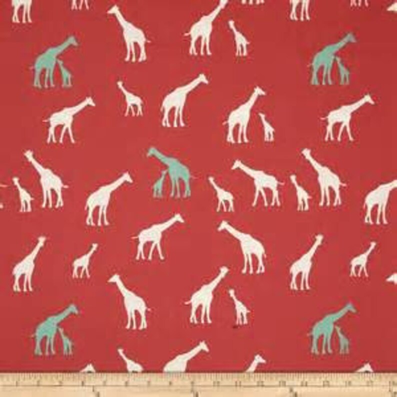 May include: Red fabric with a white and light blue giraffe pattern. The giraffes are in various poses, some with their necks stretched out and others with their heads down. The fabric is perfect for crafting projects, such as making clothes, bags, or home decor.