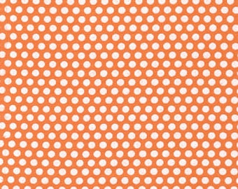 May include: Orange fabric featuring a repeating pattern of white polka dots. The dots are evenly spaced, creating a classic design. Suitable for sewing and crafting projects, this fabric has a cheerful aesthetic.