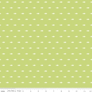 May include: A green fabric with a white repeating pattern of fish. The fabric is 12 inches wide.